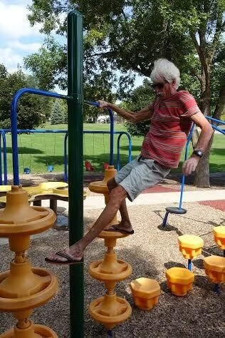 Stephen Jepson using monkey bars for strength