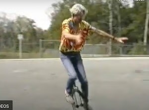 Stephen Jepson riding a unicycle